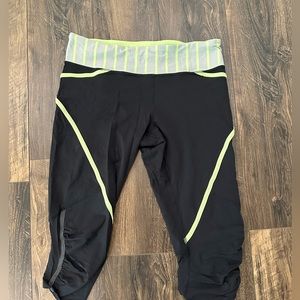 Lululemon Crop Leggings with mesh and yellow stripes